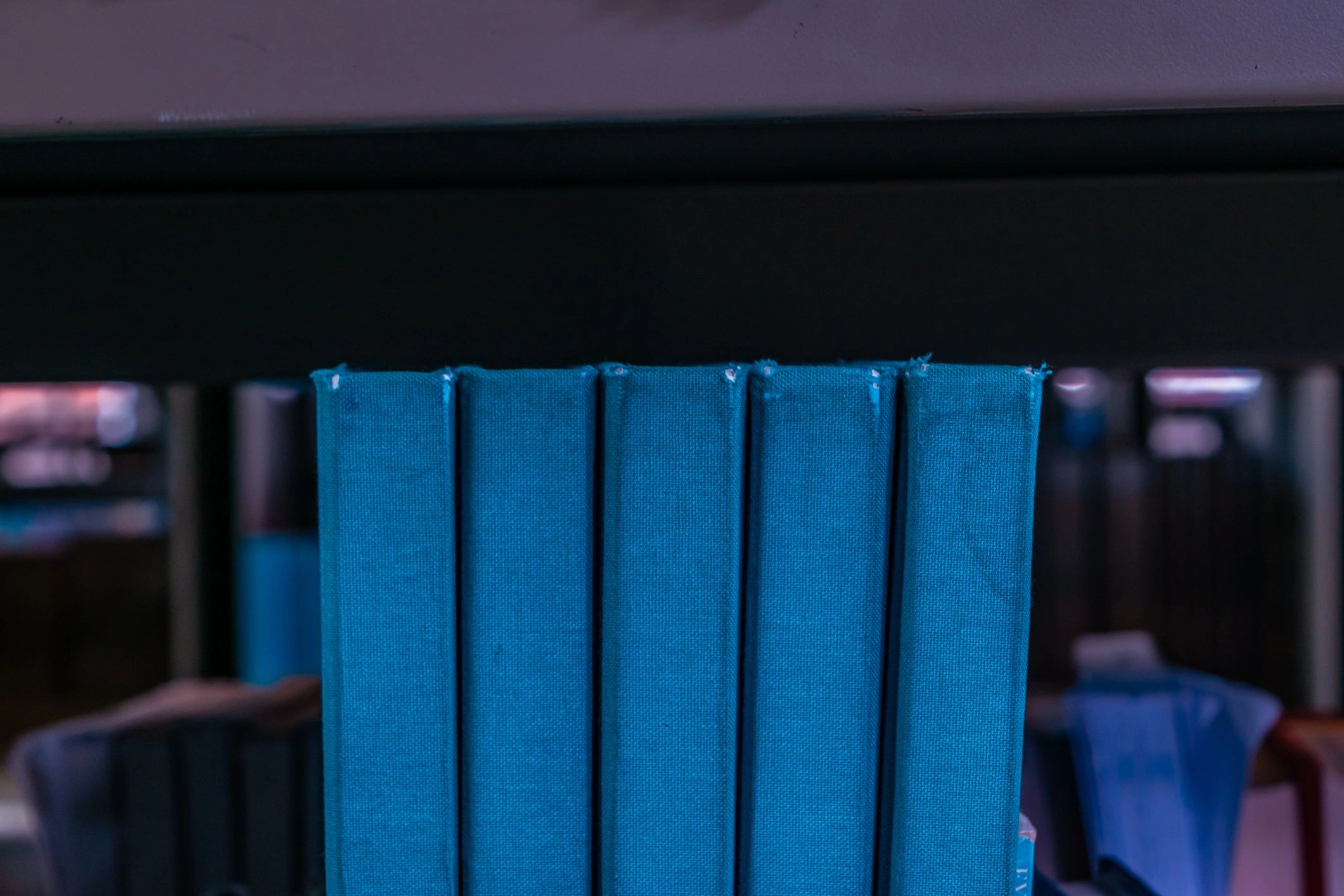 Academic books arranged on a desk